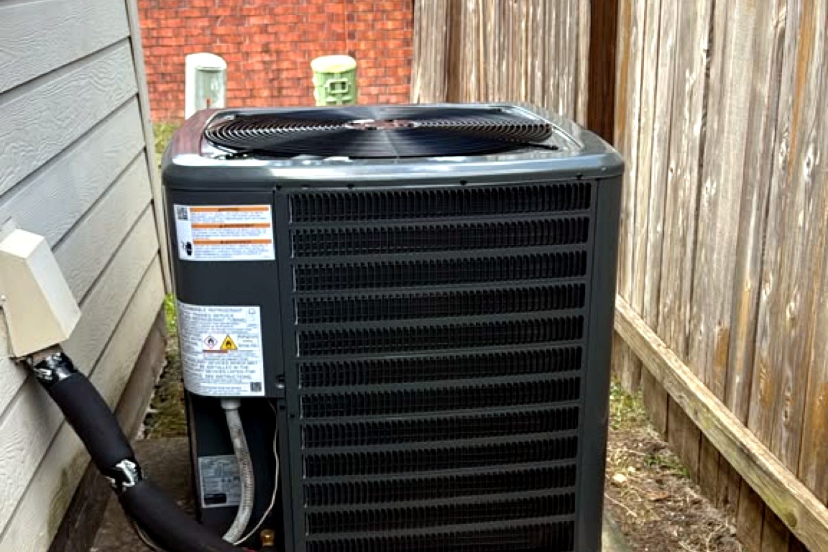 New AC condenser installed at a Houston home by Top Texas Choice