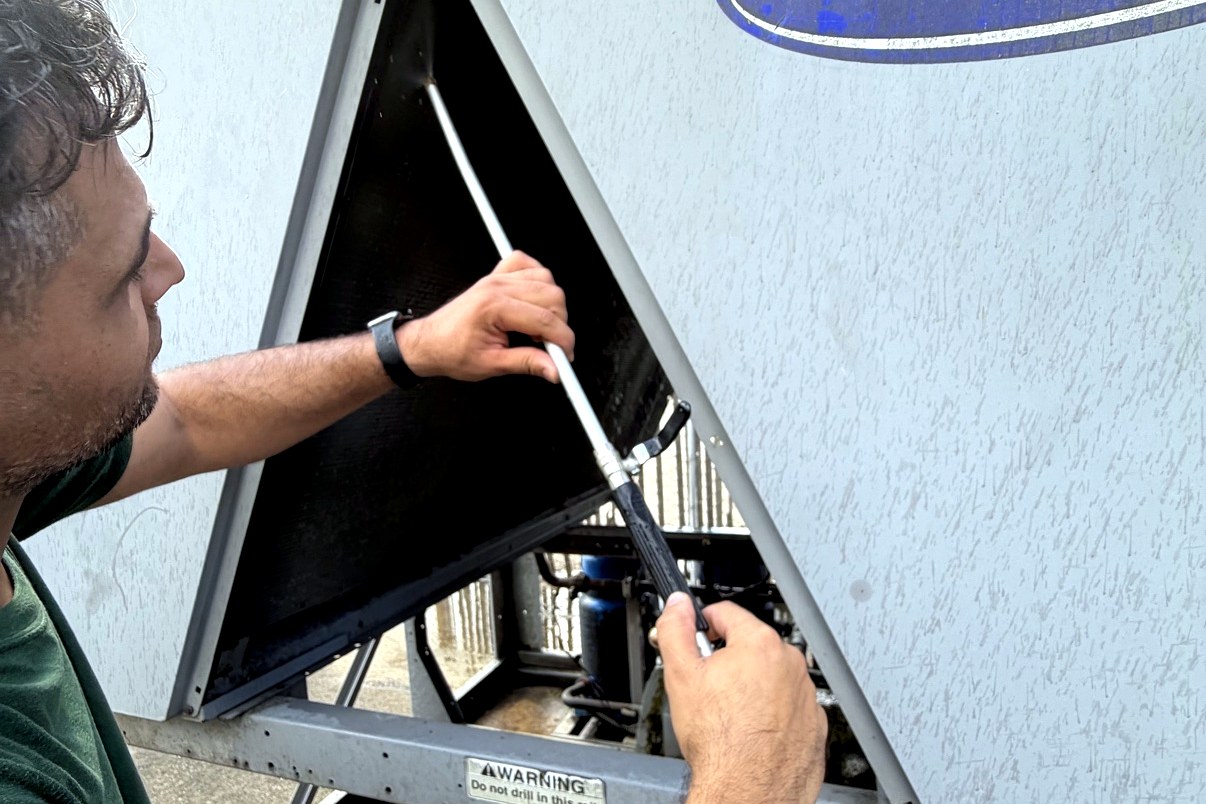 Commercial HVAC unit coil cleaning by Top Texas Choice