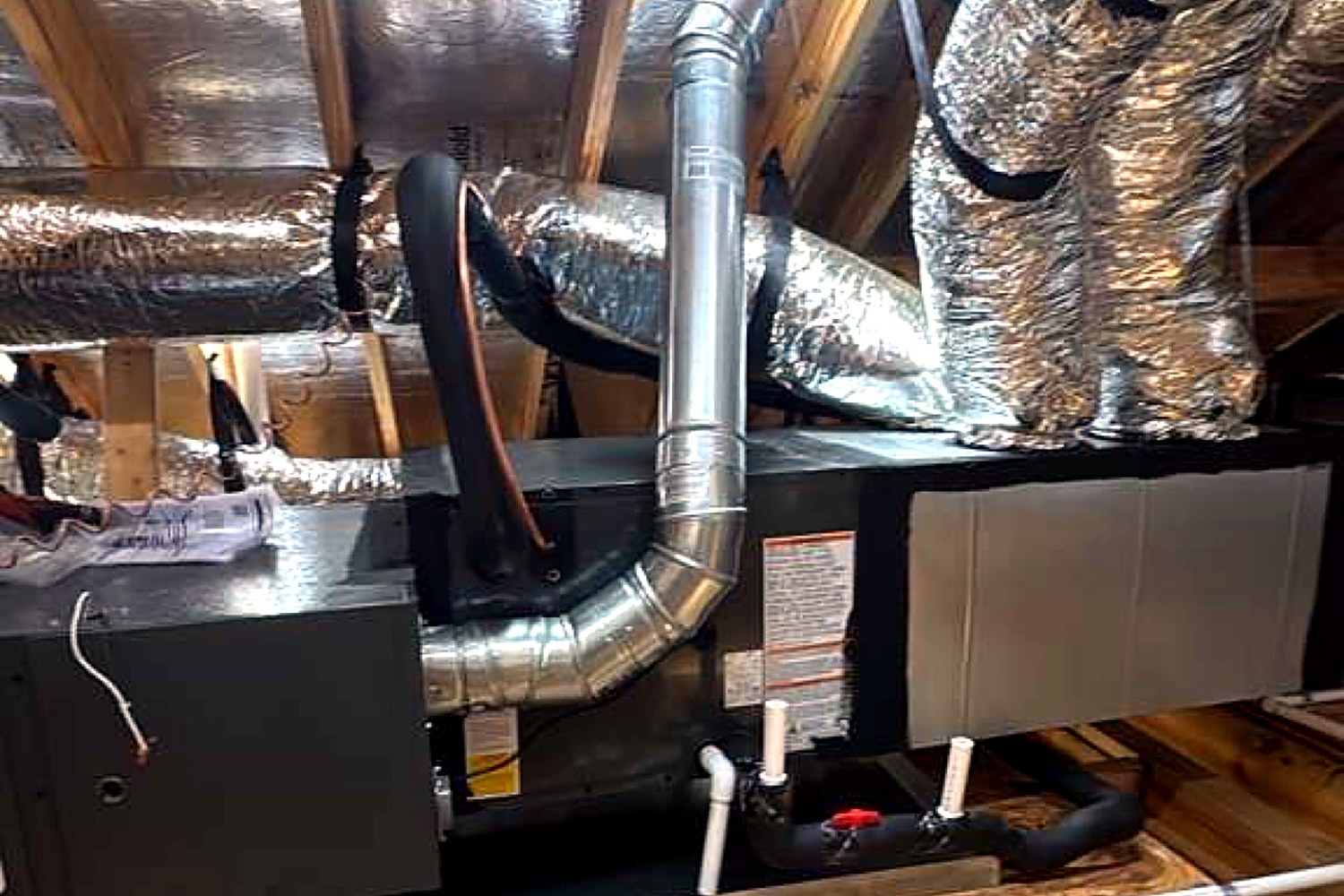 Attic air handler and ductwork installed by Top Texas Choice